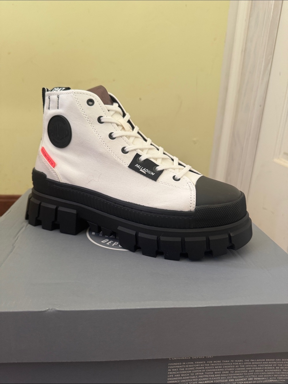 Palladium White High-Top Canvas Sneaker with Black Lug Sole